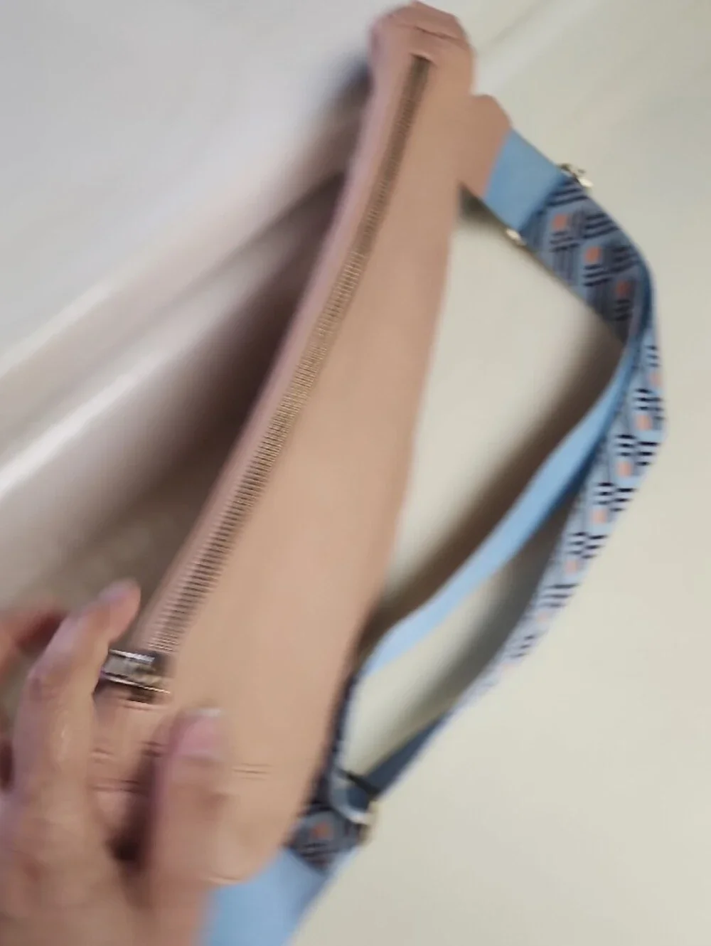 Urban Originals Peach Crescent Crossbody with Patterned Blue Strap